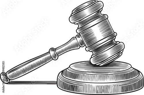 gavel rests on a wooden block ready for use.