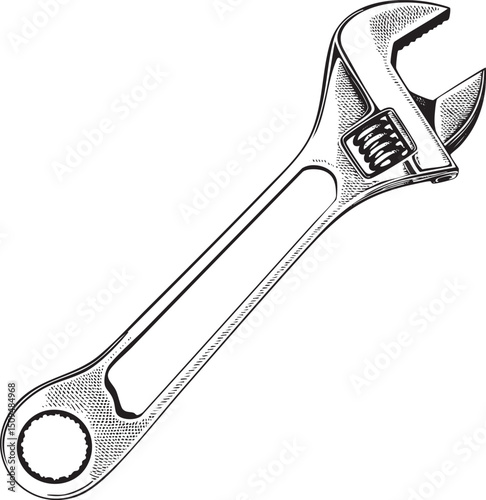 black and white adjustable wrench rests on a smooth surface.