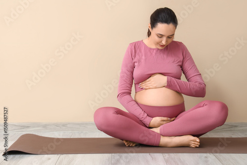 Young pregnant woman doing ...