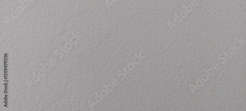 Imagen de una superficie gris con un patrón sutil de textura rugosa, ideal como fondo neutro o recurso visual para proyectos gráficos. La textura ofrece un acabado mate y uniforme con relieve fino, pe