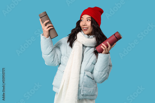 Young Asian woman in winter...