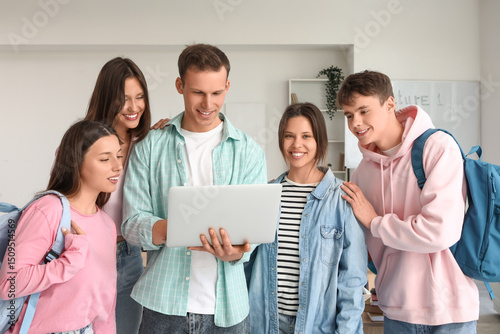 Group of students using lap...
