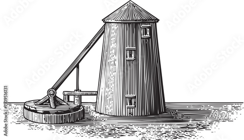 tall cylindrical mill stands on a shoreline with a crane extending toward it.