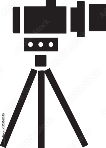 black surveying tripod supports a digital level.