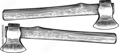 Two antique axes rest side-by-side on a white surface.