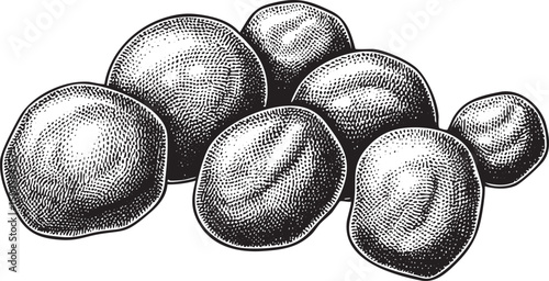 group of rounded dark plums rests on a white surface.