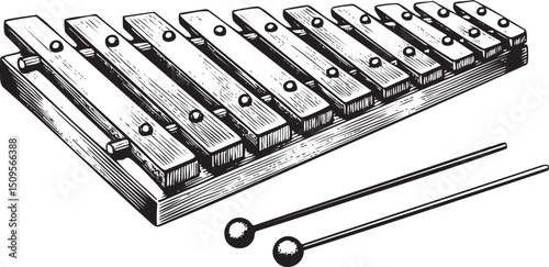 wooden xylophone rests on a dark surface ready for musical performance.