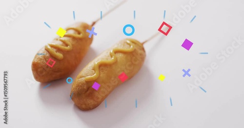 On open corn dogs resting while colorful shapes swirling in pulsing loops fading highlighting them