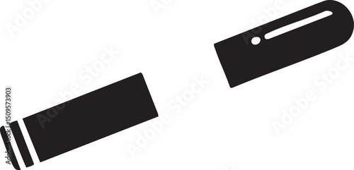 black pencil rests on a white surface partially broken.