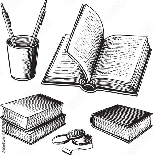black and white displays a collection of writing implements on a surface.