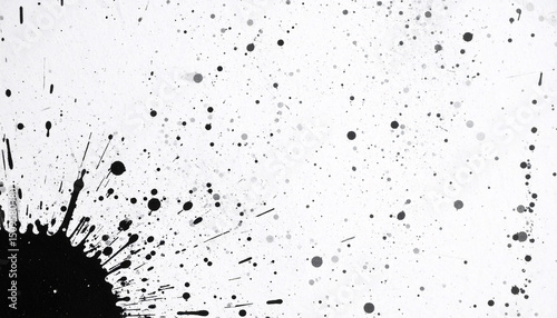 Abstract Ink Splatter: An artistic, high-angle shot presents a chaotic yet captivating abstract ink splatter, composed of a striking black ink against a stark. The art captures fluid movement.