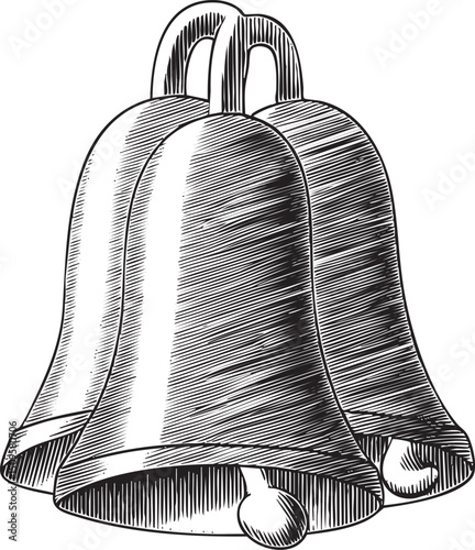 Two silver bells hang suspended from a delicate chain.