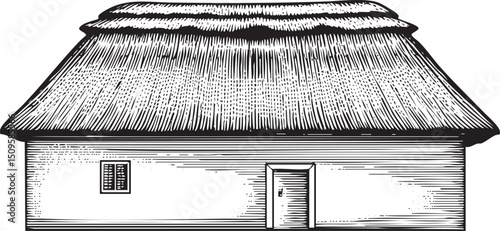 weathered rustic building with a steeply pitched thatched roof.