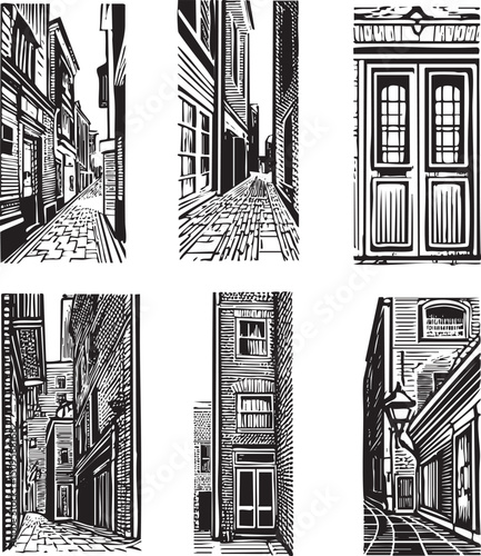 Black and white depicts a narrow cobblestone street lined with tall buildings.