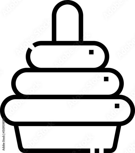 Simple stacking toy sits on a white surface, representing childhood play and development in a minimalist style.