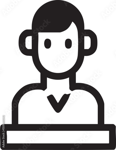 young man listens intently at a desk.