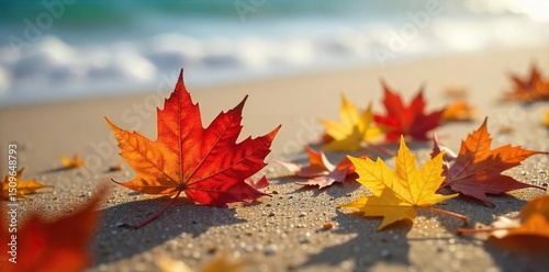 Close-up of vibrant, colorful autumn leaves scattered on a sandy beach, gently moved by the sea breeze; a serene autumnal coastal scene , fallen leaves, waves