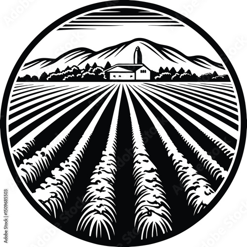 Panoramic farmland scene with plowed fields and bushes