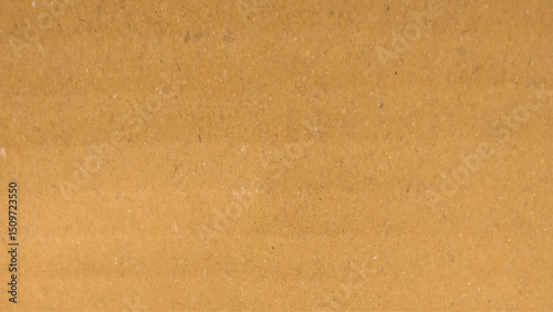 Abstract brown recycled paper background. Texture of brown craft or kraft paper background, cardboard sheet, recycle paper, copy space for text. 