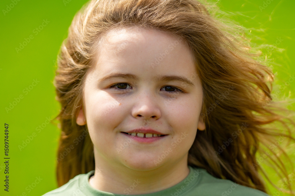 Close-up portrait of kid in summer. Kids face. Summer portrait of happy child. Child portrait in park. Cute portrait of cheerful kid outdoors. Fun face of child. Child enjoying summer. Summer vibes. Close-up portrait of kid in summer. Kids face. Summer portrait of happy child. Child portrait in park. Cute portrait of cheerful kid outdoors. Fun face of child. Child enjoying summer. Summer vibes.
