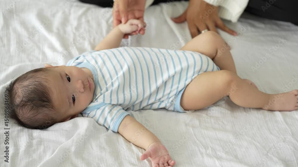 Loving parents gently hold their newborn baby, showing warmth, care, protection, and happiness in a close-up family moment of togetherness. Loving parents gently hold their newborn baby, showing warmth, care, protection, and happiness in a close-up family moment of togetherness.