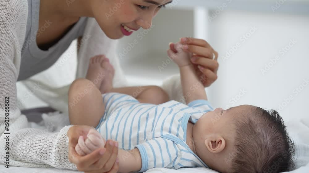 Loving parents gently hold their newborn baby, showing warmth, care, protection, and happiness in a close-up family moment of togetherness. Loving parents gently hold their newborn baby, showing warmth, care, protection, and happiness in a close-up family moment of togetherness.