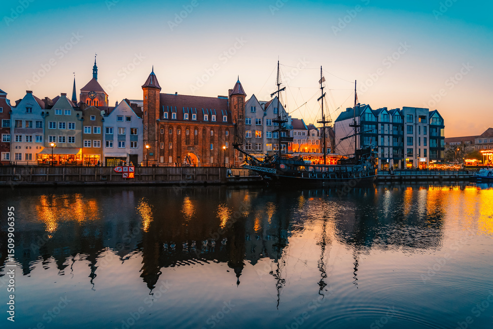 Obraz premium Gdansk with Motlawa river in Poland. Old town colourful house with Stragania Gate