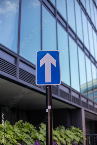 Upward Arrow Traffic Sign in Urban Setting