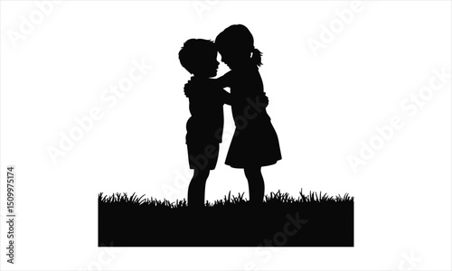 Young boy and girl embracing in grass silhouette