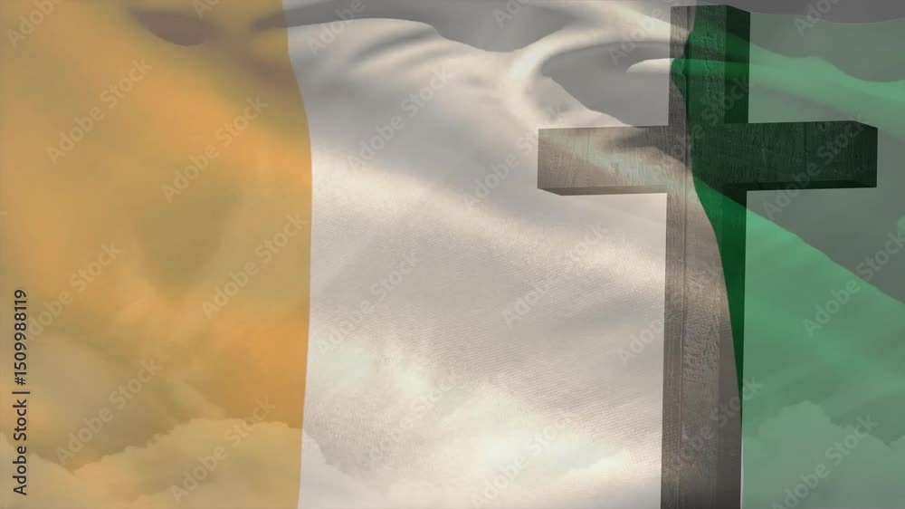 Gentle breeze picking up causing Ivory Coast flag rippling around wooden cross against clouds