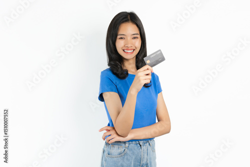 Smiling asian woman hand holding credit card on white background.