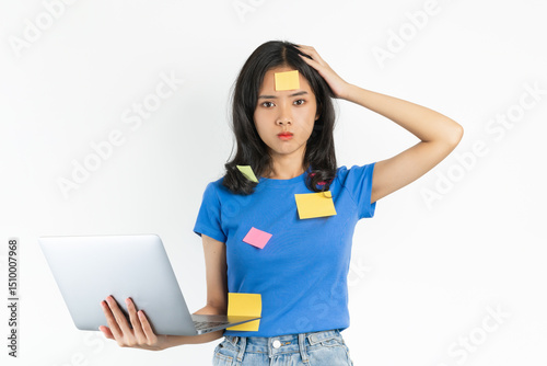 Stressed woman hand touch on mouth with and suspicious thoughtful pondering and holding computer laptop on isolated background.