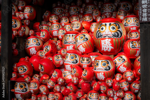 Osaka, Japan - December 2024: Scenic view of Katsuoji Temple in Minoh during peak autumn season. Beautifully framed by vibrant red and orange maple leaves, reflecting the serene atmosphere of autumn.