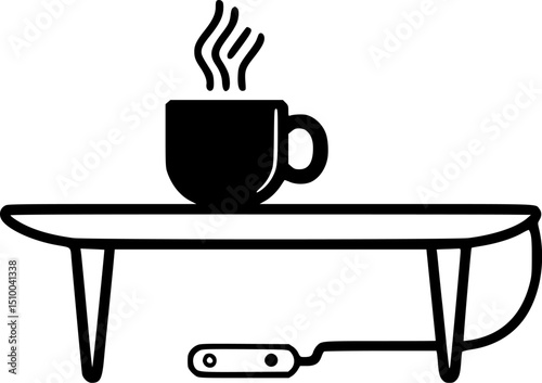 A black and white image displays a steaming cup on a table complete with a foot pedal
