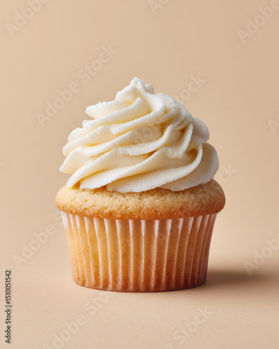 Plain white cupcake looks delicious and creamy with smooth buttercream swirl