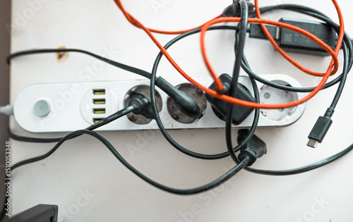 Overloaded power board at home or office.