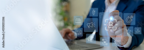 Digital marketing strategy concept. Target customer, buyer persona, customer analysis. Personalization marketing, customer centric strategies. Businessman touching on screen to target customer.