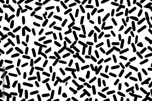 Abstract black and white geometric pattern featuring randomly distributed organic shapes for background use