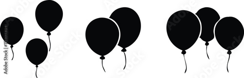 Simple black silhouettes of balloons floating