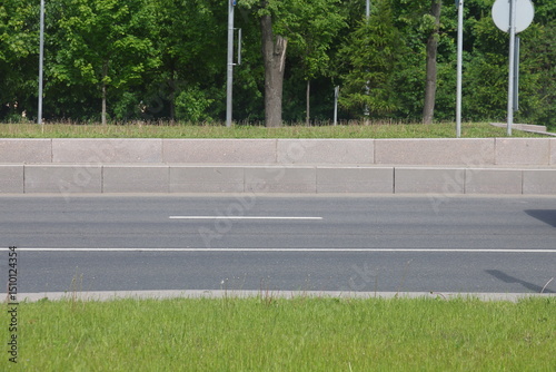 curb along the highway, asphalt and lawn along the road, minimalism 2