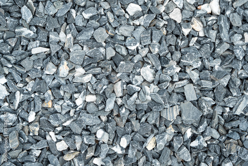 Wallpaper Mural Close-up of natural crushed gravel stones in shades of gray and white. Ideal for construction, landscaping, or texture background. Torontodigital.ca