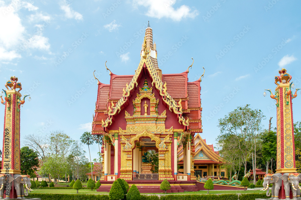 Fototapeta premium Golden Chapel at Wat Maha That Wachiramongkol (Wat Bang Thong), Phang Nga, Thailand – Ornate Thai Temple Architecture in Sacred Setting