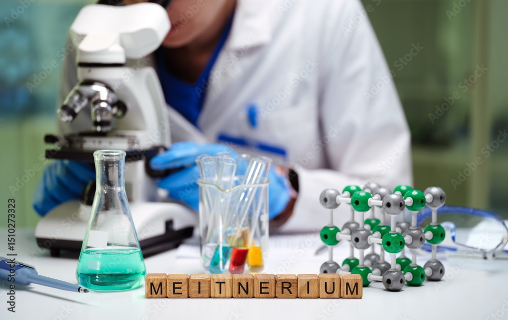 Fototapeta premium A researcher conducts multiple experiments using a powerful microscope along with various laboratory equipment