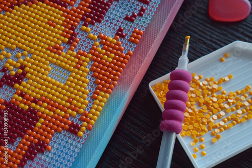 Detailed view of diamond painting in progress showing vibrant colorful beads on a canvas perfect for DIY creative hobbies handmade crafts and artistic workshop concepts
