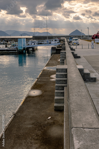 Ferry Approaching Naoshima Island during Tranquil Evening Light, Setouchi, Japan