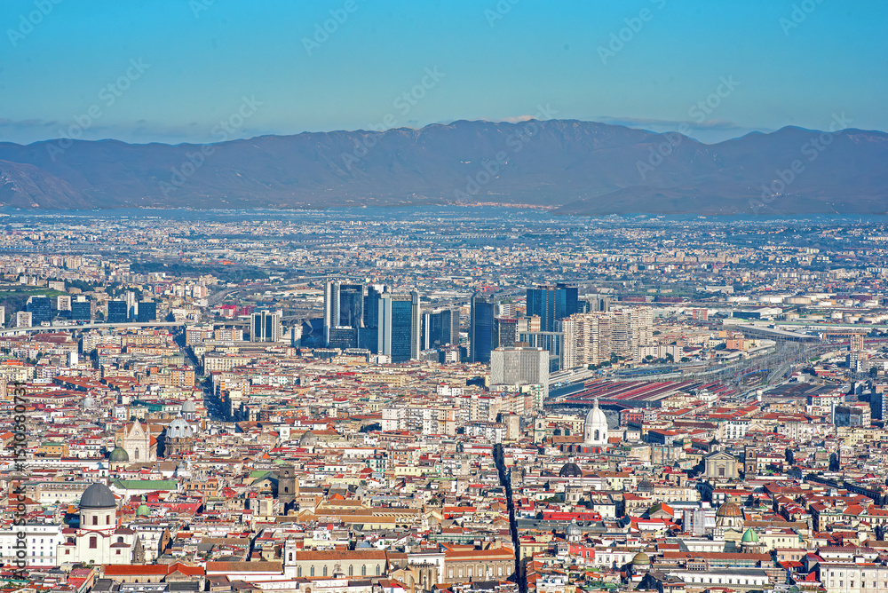 Obraz premium Panoramic view of the metropolitan area of Naples, the suburbs and the mountains to the northeast of the city.