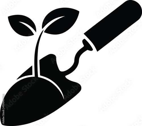 Trowel with young plant in soil – garden growth silhouette