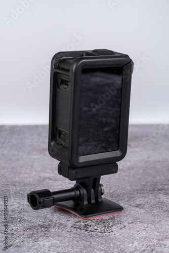 black action camera front view placed on the table