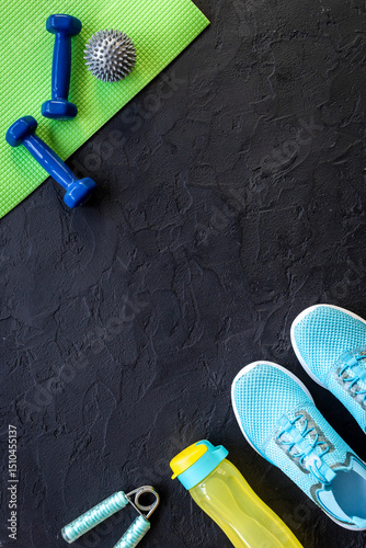 Sport fitness tolls flat lay with sneakers and dumbbells, top view