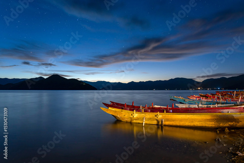 Breathtaking Starry Sky and Sunrise Over Tranquil Lugu Lake in Yunnan